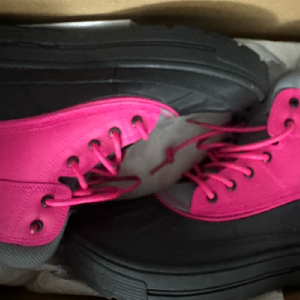 Nike Pink and Black Sneakers with Bold Design
